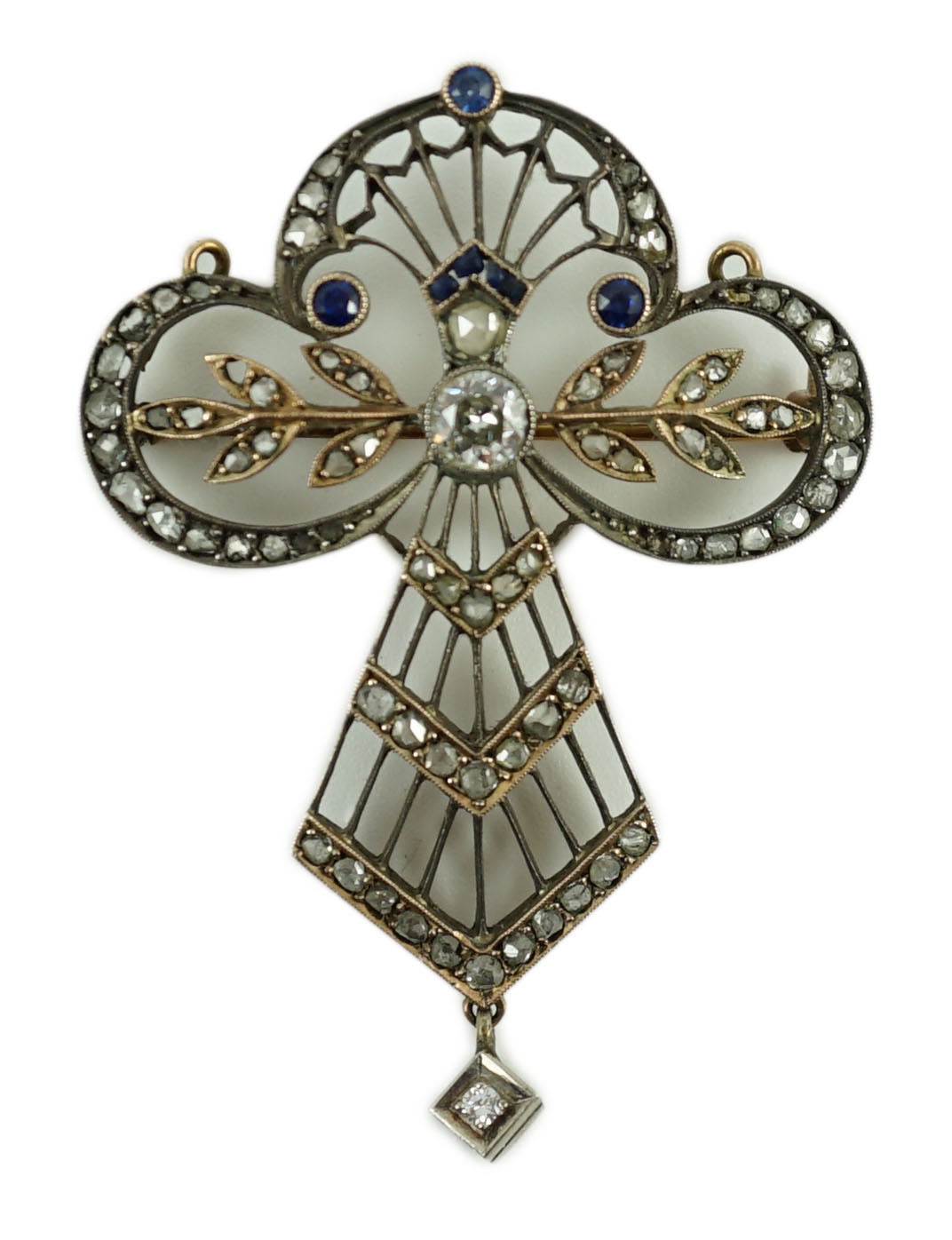 A Belle Epoque gold and silver, sapphire and diamond set openwork drop pendant brooch